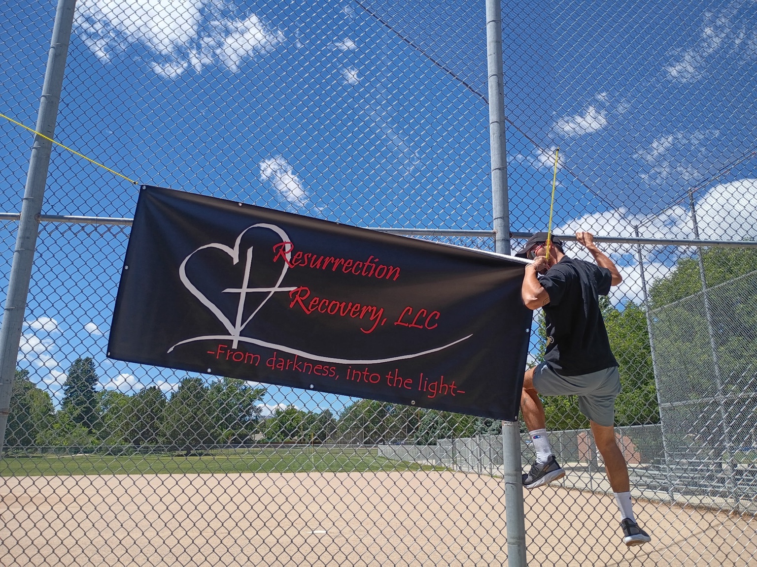 picture of resurrection recovery hanging banner before community group